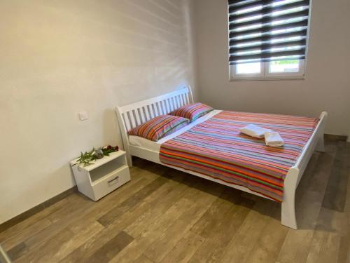 Postel nebo postele na pokoji v ubytování Villa Nikola