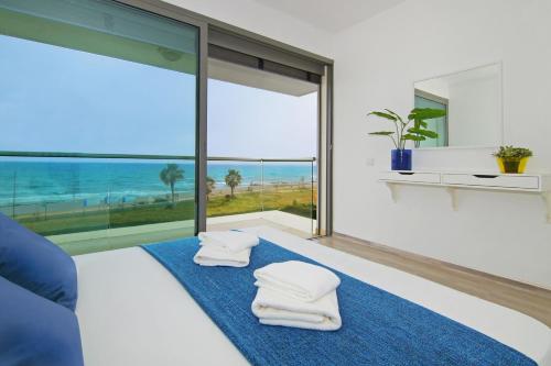 Postel nebo postele na pokoji v ubytování Villa Napa Seaside