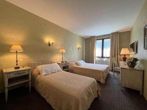 Postel nebo postele na pokoji v ubytování Hotel Million
