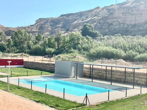 Bazén v ubytování Precioso Piso Monzón Terraza, PARKING,PISCINA,zona de juegos nebo v jeho okolí