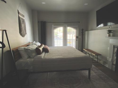 a bedroom with a bed with two teddy bears on it at Winter Park Chateau in Winter Park