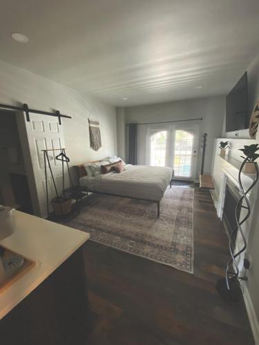 a bedroom with a bed and a fireplace at Winter Park Chateau in Winter Park