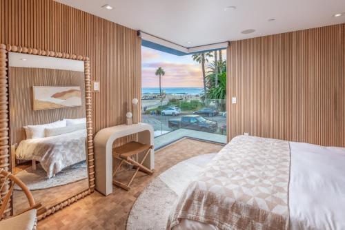 Ένα ή περισσότερα κρεβάτια σε δωμάτιο στο Sud Moonlight Beach Luxury Home