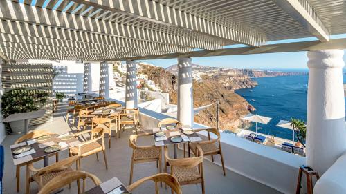 A restaurant or other place to eat at Iconic Santorini, a Boutique Cave Hotel