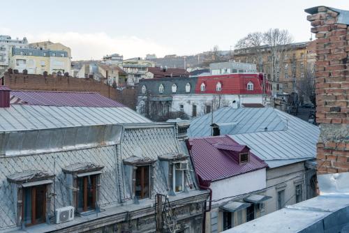 an overhead view of roofs of buildings in a city at HB apartments Laghidze in Tbilisi City