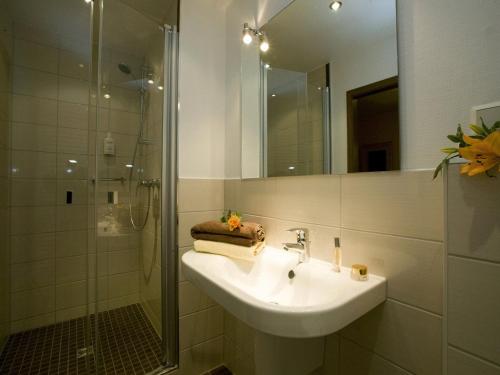 Ванная комната в Urlaubs- und Wellnesshotel Friederike