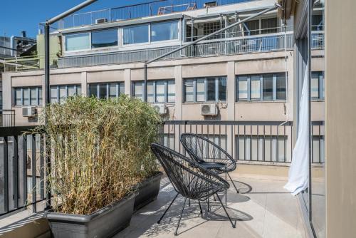 Ein Balkon oder eine Terrasse in der Unterkunft The Artisan Suites