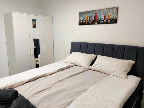 Кровать или кровати в номере Apartman s dvije spavaće sobe