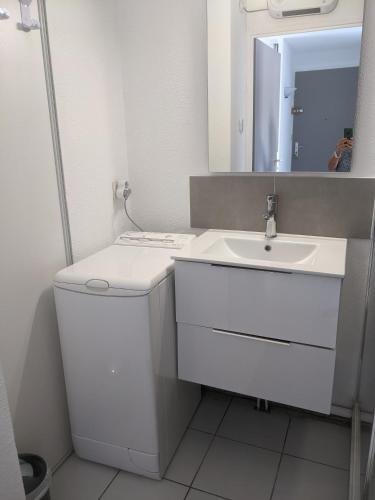 Bilik mandi di T3 de 65 m² avec accès direct à la plage