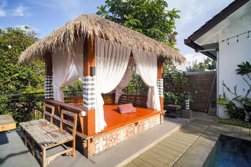 Сад в Omah Angkul Angkul Villa