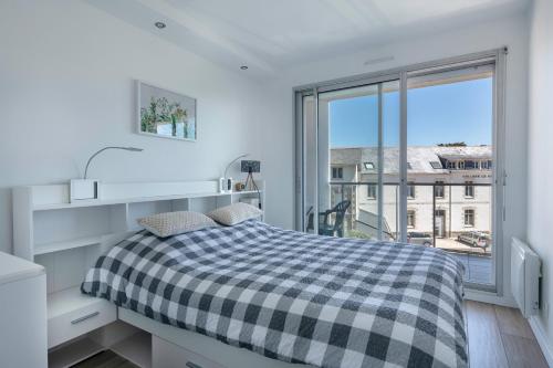 Posteľ alebo postele v izbe v ubytovaní A 30 mètres de la plage bel appartement pour 6