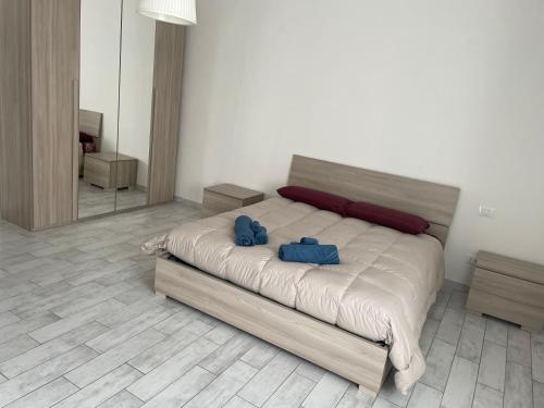 Ένα ή περισσότερα κρεβάτια σε δωμάτιο στο Vivere il Borgo sul lago