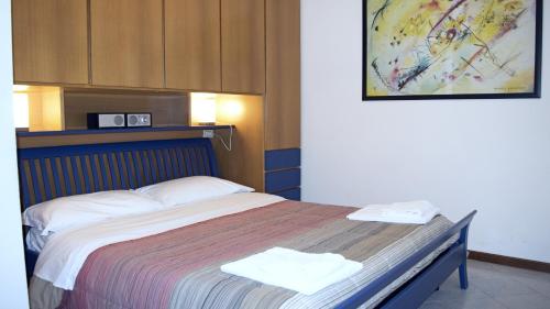 A bed or beds in a room at Casa Mafalda