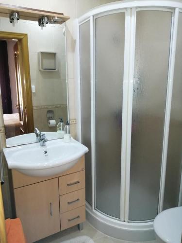 a bathroom with a shower and a sink at Casa Carla in Sotoserrano