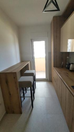 Кухня или мини-кухня в Apartman ALEKSA
