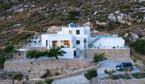a house on the side of a mountain at Villa Aires in Vrachasi