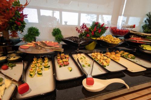 a buffet with many different types of food on a table at Vira Otel Suites in Sinop