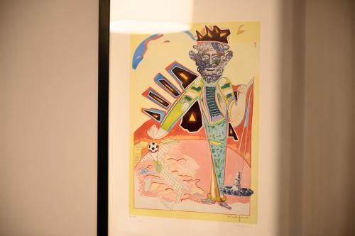 a painting of a skeleton with a crown on it at Dream House Pompei in Pompei