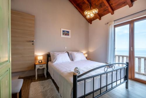 Ένα ή περισσότερα κρεβάτια σε δωμάτιο στο Villa Endless View