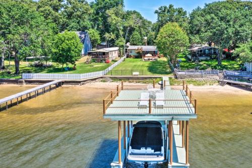 an aerial view of a boat in the water at Lakefront Mabank Gem with Sunset Views Pets Welcome in Mabank