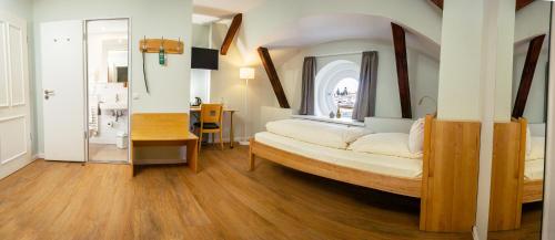 Postel nebo postele na pokoji v ubytování Hotel Alter Kreisbahnhof