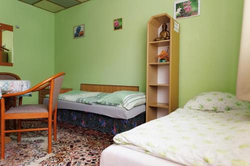 Ένα ή περισσότερα κρεβάτια σε δωμάτιο στο Tatry Liptov