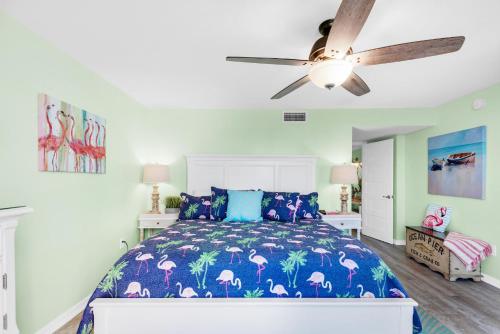 a bedroom with a bed and a ceiling fan at Shoreline Towers 2025 in Destin