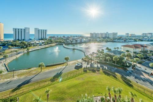 a view of a river with a city in the background at Pelican Beach Terrace 805 in Destin