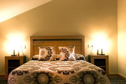 Llit o llits en una habitació de Apartamentos Turísticos Cúllar Vega