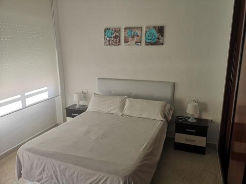 Katil atau katil-katil dalam bilik di Apartamento 60 m2 en la playa