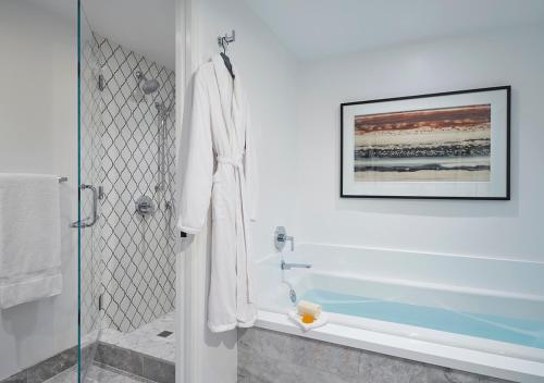 a bathroom with a shower with a glass door at Ojai Valley Inn in Ojai