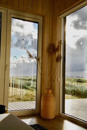 Gallery image of AITVARU TERASOS apartamentai pirmame aukšte su terasa į kanalą in Svenele