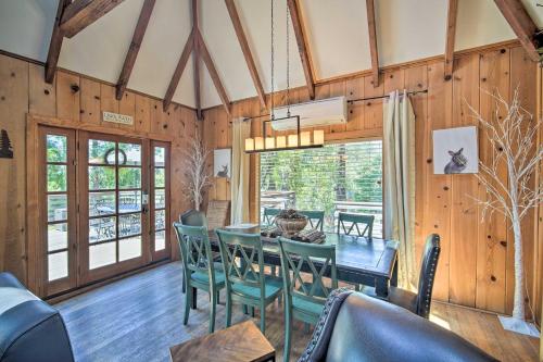a dining room with a table and chairs at Lakeview Lodge Fit for Groups Less Than 1 Mile to Lake! in Lake Arrowhead