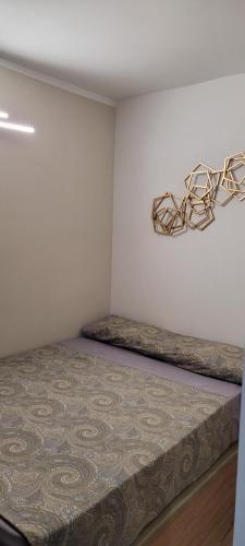 a bedroom with two beds in a room at A ESTRENAR PRECIOSOS APARTAMENTOS APARTHOTEL INTER2, NEW APARTMENTS lN APARTHOTEL 12 months open! self check in! RESERVA Garaje! in Salou