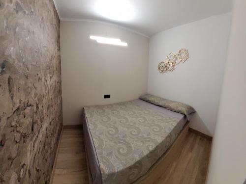Postel nebo postele na pokoji v ubytování A ESTRENAR PRECIOSOS APARTAMENTOS APARTHOTEL INTER2, NEW APARTMENTS lN APARTHOTEL 12 months open! self check in! RESERVA Garaje!