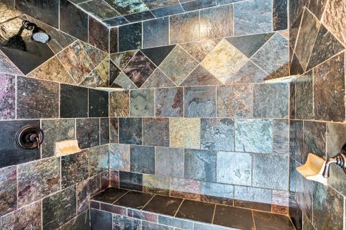 a bathroom with a large tiled shower with at Clifton Retreat with Breathtaking Mt Backdrop! in Clifton
