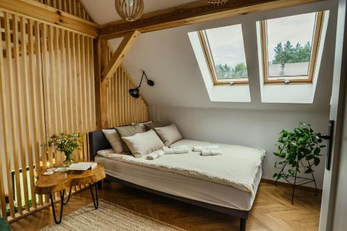 Posteľ alebo postele v izbe v ubytovaní Domki Jodełka