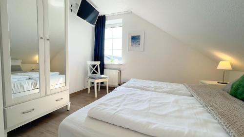 Ένα ή περισσότερα κρεβάτια σε δωμάτιο στο Haus-Kirsten-Fewo-Nr-6
