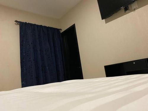 Katil atau katil-katil dalam bilik di Hotel Central Pirámides