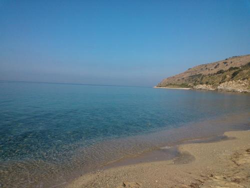 a view of a beach with the ocean at Hotel Ristorante Antica Marina in Nicotera Marina