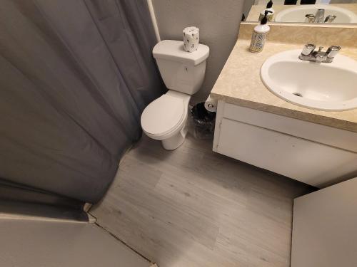 Een badkamer bij Deluxe Hotel Style Unit