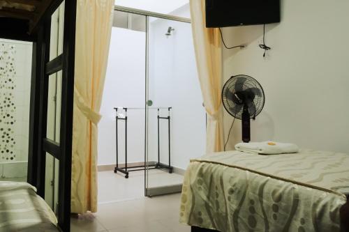 Ein Bett oder Betten in einem Zimmer der Unterkunft Hospedaje El Velero