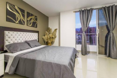 Cama o camas de una habitación en Amplio Apartamento en Calasanz - Estadio