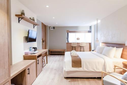 TV a/nebo společenská místnost v ubytování Saksiam Lakeside Resort