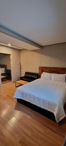 Cama ou camas em um quarto em Huesik