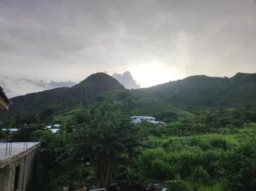a view of a valley with mountains in the background at POSADA ALEENY in Providencia