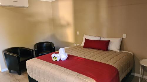 Postel nebo postele na pokoji v ubytování Boggabri Motel