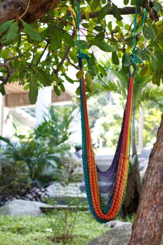 two hammocks hanging from a tree at 2 Bays Villa in Thong Nai Pan Yai
