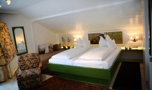 เตียงในห้องที่ Berghotel Hois