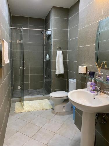 a bathroom with a shower and a toilet and a sink at Gobi-Girl in Ulaanbaatar
